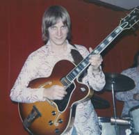 click to enlarge - Lame band shirts was the style in this 1974 shot of Don playing his ‘60's L-5